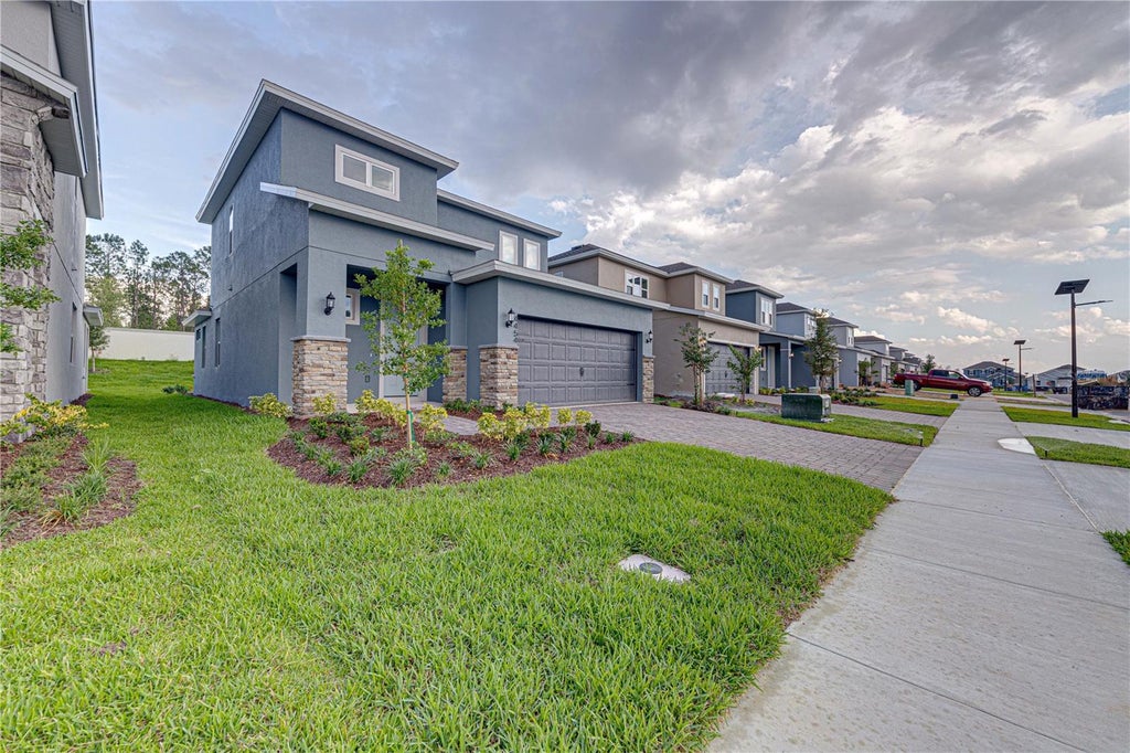 Photo of 4454 Davos Drive, Clermont, FL 34711 (MLS # O6442787)