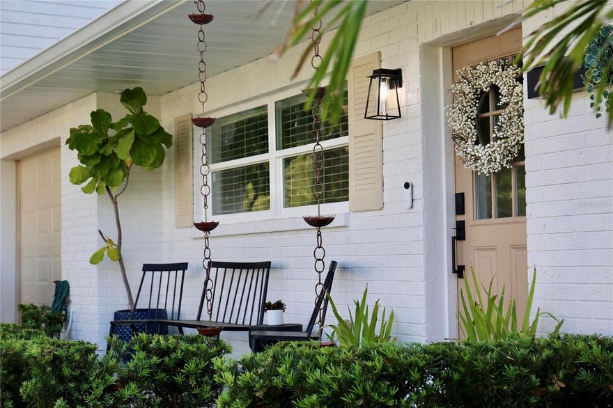 Welcome to 4613 S Ferdinand Ave, a beautifully appointed 4 bedroom, 2 bath home in one of South Tampa's most sought-after neighborhoods. What sets this home apart starts with what matters most right now: it is NOT in a flood zone, NO flood insurance is required (flood zone X), and it stayed completely dry through both recent hurricanes with zero damage. Premiums are remarkably low for the area. Step outside and you'll find one of the best-appointed yards in South Tampa. The grounds are stunning, framed by mature oak trees that deliver tons of shade and timeless character. The oak branches were just professionally trimmed ahead of hurricane season, so you can enjoy the beauty with confidence. Inside, the home is move-in ready and meticulously maintained throughout. Every detail has been cared for, and the home is beautifully furnished. Some of the furniture may be available separately, so you can step right into a turnkey lifestyle if you choose.  Restoration Hardware, Rejuvenation, and Arteriors light fixtures convey with the home. Located in established Bayshore Beautiful, you're minutes from Bayshore Boulevard, top dining and shopping, MacDill Air Force Base, downtown Tampa, and easy access to the Selmon Expressway and bridges to St. Pete and the beaches. A well-maintained home, an unbeatable yard, low insurance, and true peace of mind. This one is special. Come see it for yourself.
