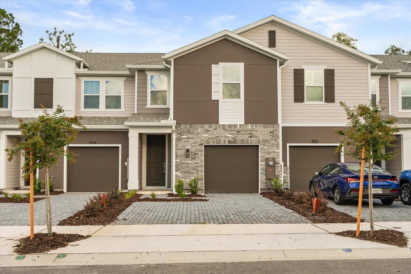 Stunning - brand-new executive Townhome in waterfront community of Towns at Riverwalk. Clean - modern design with an open floorpan, featuring ceramic tile on first floor, a gourmet kitchen with solid surface counters, stainless steel appliances and nice sized pantry. Second floor with upgraded plush carpeting. nice sized bedrooms and generous bathrooms. Unit back up to a conservation area for total privacy. Located within minutes from Downtown Sanford, shops, entertainment and major highways. Call and schedule your viewing today !