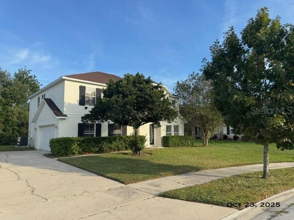 Photo of 413 Country Cottage Lane, Winter Garden, FL 34787 (MLS # O6355639)