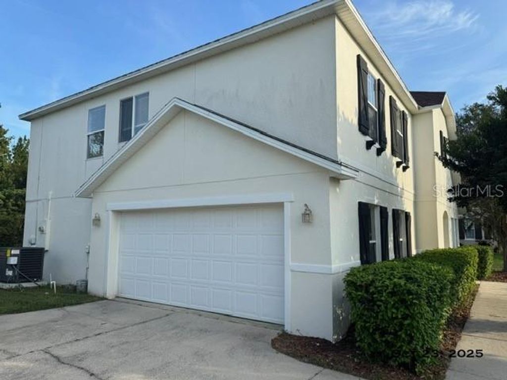 Photo of 413 Country Cottage Lane, Winter Garden, FL 34787 (MLS # O6355639)