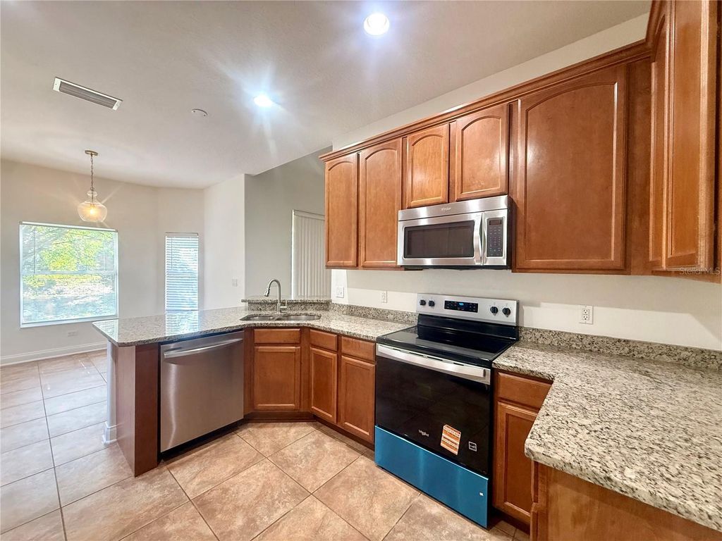 Photo of 6984 Brescia Way, Orlando, FL 32819 (MLS # O6407727)