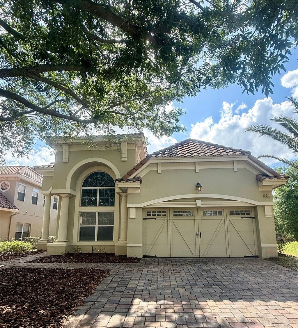 Photo of 6984 Brescia Way, Orlando, FL 32819 (MLS # O6407727)