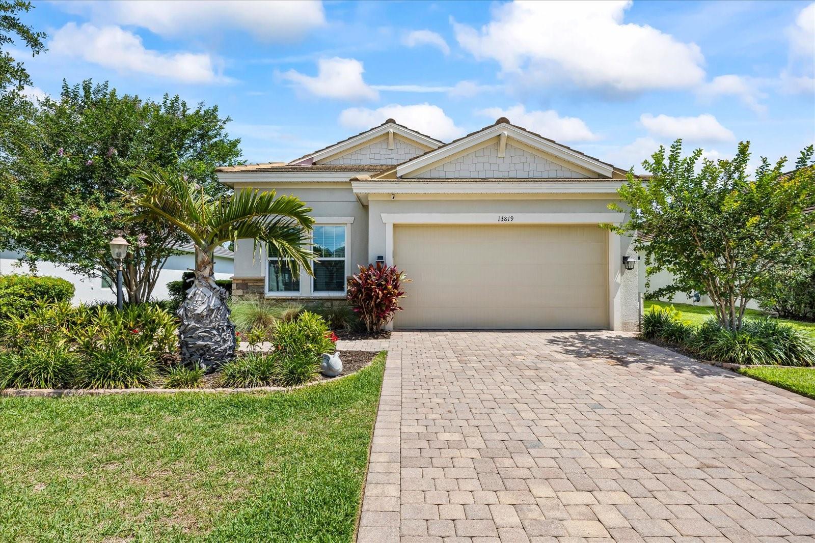 Welcome to The ARECA by Meritage Homes, an impeccably upgraded 4-bedroom, 2-bath home nestled in the gated community of Savanna at Lakewood Ranch. Situated on a premium lot with lush landscaping and the added benefit of easements on both sides, this home offers privacy, space, and standout curb appeal with its Craftsman-style exterior, tile roof, and brick paver driveway, walkway, and designer salt water pool complete with sun shelf for those relaxing sunny days. Inside, you’ll find soaring 10-foot ceilings, an elegant 8-foot glass-inset front door, and 8-foot interior doors throughout, creating a spacious and airy atmosphere. The main living areas are finished with durable tile flooring, while the bedrooms feature stylish laminate floors.
The gourmet kitchen is a showstopper, boasting 42” painted maple cabinetry with crown molding, quartz countertops, stainless steel appliances including a gas cooktop, double wall ovens, a vented microwave, and a large center island—all enhanced by smart under-cabinet lighting. The open-concept design flows into the family room, where a custom fireplace feature wall adds warmth and sophistication. Large sliding glass doors lead out to the screened lanai, the perfect place to relax or entertain guests. The private backyard is a true oasis with a 9,600-gallon saltwater pool featuring a gas heater and sun shelf, child safety fencing, and a fully equipped outdoor kitchen with a gas grill, fridge, and storage— even the ceiling in the lanai is upgraded to a charming wood plank ceiling.
Additional upgrades include a whole-home generator, epoxy-coated garage floor with a 4-foot extension, quartz countertops in all bathrooms, a private owner’s entry, shiplap accent walls, and a full privacy fence. The 2-car garage is both functional and spacious, offering added room for storage or a workshop. As part of the highly desirable Savanna at Lakewood Ranch community, residents enjoy a lifestyle rich in amenities including a clubhouse, resort-style pool, fitness center, playground, dog parks, event lawn, and more. HOA fees include lawn mowing, edging, and irrigation, making for low-maintenance living. Known for their energy-efficient construction, Meritage Homes help you live a healthier, quieter lifestyle while saving on monthly utility costs. This home truly combines luxury, functionality, and Florida living at its finest. Discover the lifestyle you’ve been dreaming of in Savanna at Lakewood Ranch! This vibrant, low-HOA community offers resort-style amenities including a stunning clubhouse, sparkling pool, modern fitness center, basketball courts, playground, dog park, and scenic walking trails.
Located in one of Florida’s most sought-after areas, Lakewood Ranch is celebrated for its top-rated A+ schools and unbeatable convenience—just minutes from downtown Sarasota, St. Pete, world-class shopping, fine dining, and the iconic Gulf Coast beaches.
Don't miss your chance to enjoy the very best of Florida living—your new home awaits in Savanna!