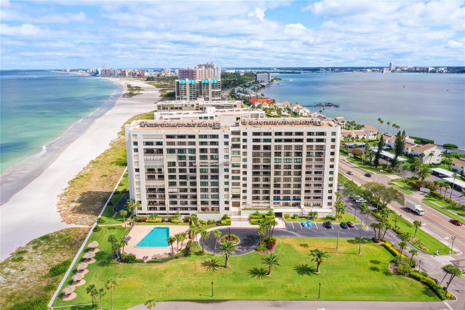 BREATHTAKING PANORAMIC WATER VIEWS FROM THIS 11TH FLOOR NEWLY REMODELED 2 BEDROOMS, 2 FULL BATHROOMS FURNISHED BEACH PARADISE WITH VIEWS OF THE GULF OF MEXICO AND THE INTRACOASTAL WATERWAY. THIS UPDATED CONDO HAS WOOD LOOKING TILE FLOORS THROUGHOUT WITH QUARTS COUNTER TOPS, WHITE KITCHEN CABINETRY, AND BRAND NEW STAINLESS STEEL APPLIANCES. THE MASTER BEDROOM HAS A KING SIZE BED AND MASTER BATH ENSUITE WITH WALKTHROUGH CLOSET. THE GUEST BEDROOM HAS A QUEEN SIZE BED WITH AN ADDITIONAL FULL SIZE BED UNDERNEATH. THE WASHER & DRYER ARE INSIDE THE UNIT AND ALSO NEW. COVERED CARPORT IS AVAILABLE, AND THERE IS PLENTY OF GUEST PARKING AROUND THE PERIMETER OF THE PROPERTY. SOUTH BEACH IS A PRIVATE GATED OCEAN FRONT COMMUNITY DIRECTLY ON THE POWDERY SAND OF CLEARWATER BEACH WITH A CLUB HOUSE AND A THERMALLY HEATED POOL, ALLOWING YEAR ROUND SWIMMING ENJOYMENT. THE CONVENIENT BEACH TROLLEY JUST STEPS OUTSIDE THE GATE WILL TAKE YOU TO TOP RATED RESTAURANTS, SHOPPING AND ENTERTAINMENT. THE TAMPA INTERNATIONAL AIRPORT AND CLEARWATER AIRPORT ARE ONLY 20 MINUTES AWAY. TAMPA AND ST. PETERSBURG ARE IN CLOSE PROXIMITY GUARANTEEING YOU WILL ALWAYS HAVE SOMETHING FUN & INTERESTING TO DO. COME SEE WHY CLEARWATER BEACH IS RATED #1 BEACH IN THE USA.