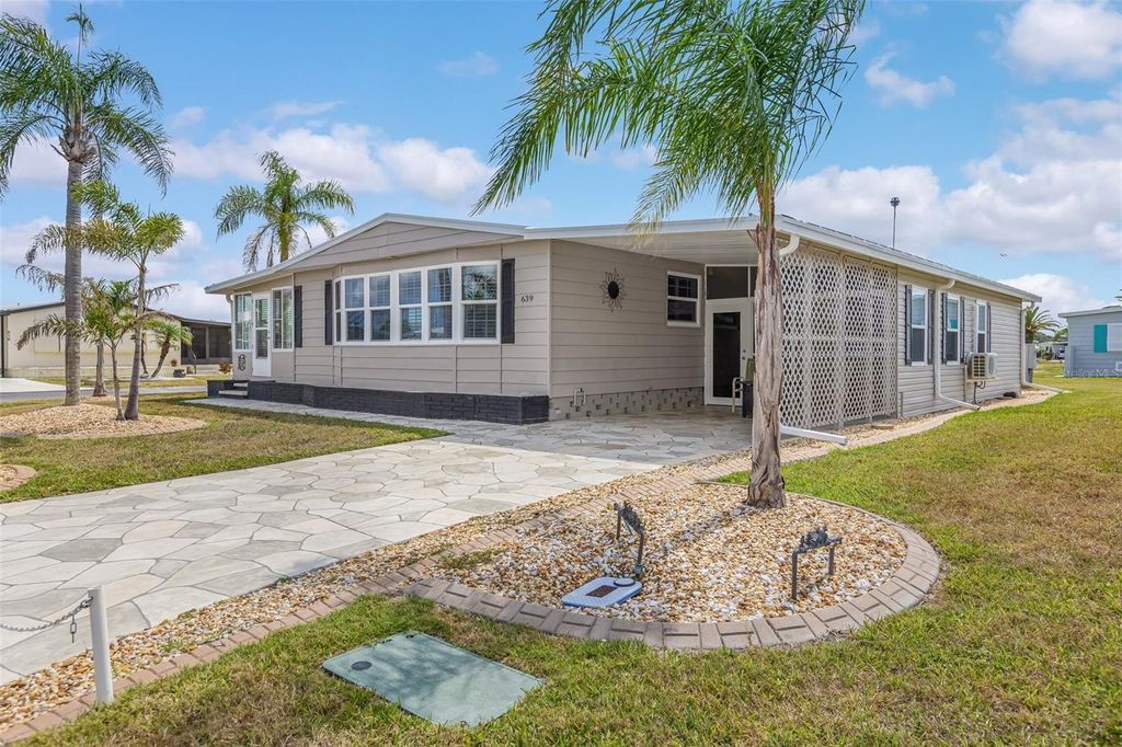 Photo of 639 La Jolla Circle, North Port, FL 34287 (MLS # TB8466966)