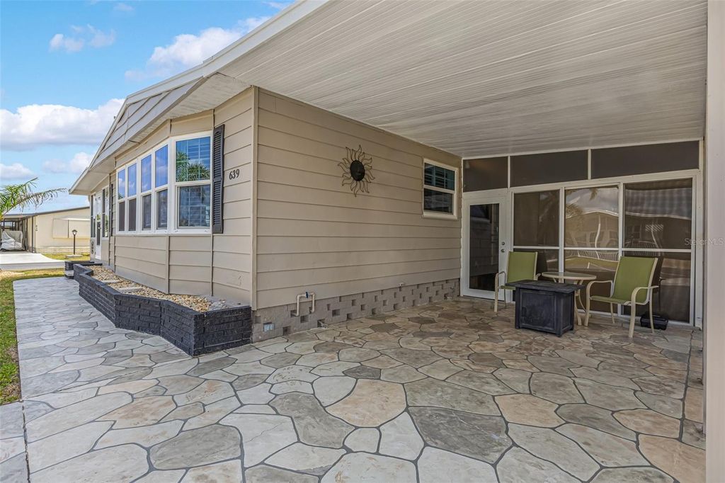 Photo of 639 La Jolla Circle, North Port, FL 34287 (MLS # TB8466966)