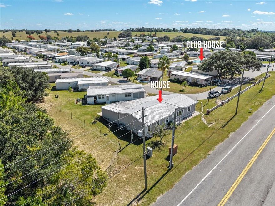 Welcome to Twin Fountains, a 55+ community where you OWN the land! Built in 2005, this beautifully maintained 3-bedroom, 2-bath manufactured home offers just over 1,700 sq. ft. of living space and sits on a desirable corner lot with no rear neighbors. Upon arrival, you'll be greeted by an oversized driveway providing plenty of parking space.
Inside, you’ll find an open floor plan featuring a large living room with hurricane windows and a beautiful fireplace, along with a separate dining room also showcasing a hurricane window. The spacious kitchen offers an abundance of cabinet and countertop space, a pantry, and a convenient pass-through window overlooking the dining and living areas.
The split layout provides privacy, with an oversized master bedroom featuring an ensuite bathroom that includes a walk-in shower, double vanity, and a new Safe Step walk-in tub for safety and comfort. On the opposite end, you’ll find two spacious guest bedrooms and a guest bathroom. The kitchen features tile flooring, the main living areas have plank flooring, and the bathrooms are finished with linoleum.
This meticulously cared-for home also includes an inside laundry room with access to the enclosed Florida room featuring glass windows, as well as an attached golf cart garage. Additional highlights include a whole-house water softener and filtration system.
Twin Fountains offers a low HOA of just $180 per month, which covers water, sewer, lawn maintenance, internet, cable, and access to a wide range of amenities—including a heated pool, clubhouse, and shuffleboard. RV/boat storage is also available (check with HOA for availability).
Conveniently located off N Scenic Hwy near Dundee, Haines City, and Winter Haven, this home provides easy access to I-4, Tampa, Orlando, and all of Central Florida’s attractions.