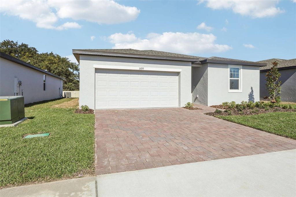 Photo of 2699 Sedgefield Circle, Haines City, FL 33844 (MLS # O6352369)