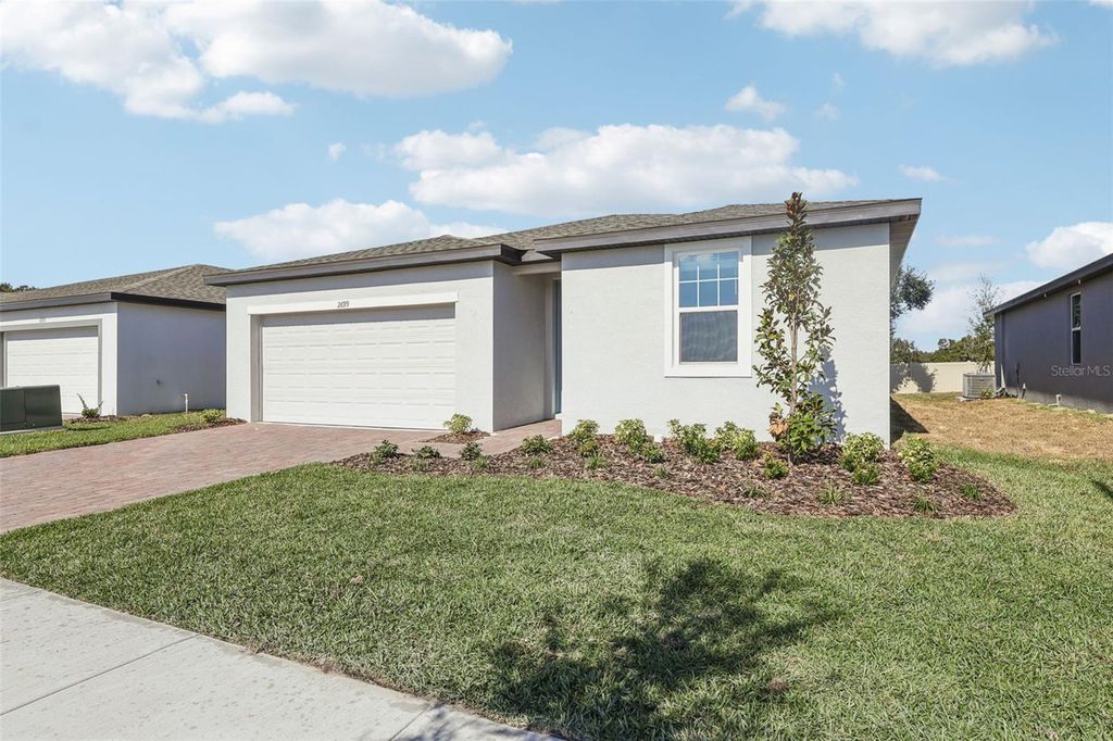 Photo of 2699 Sedgefield Circle, Haines City, FL 33844 (MLS # O6352369)