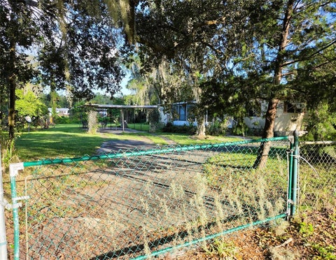 Photo of 613 Carpenter Road, Orlando, FL 32833 (MLS # O6452120)