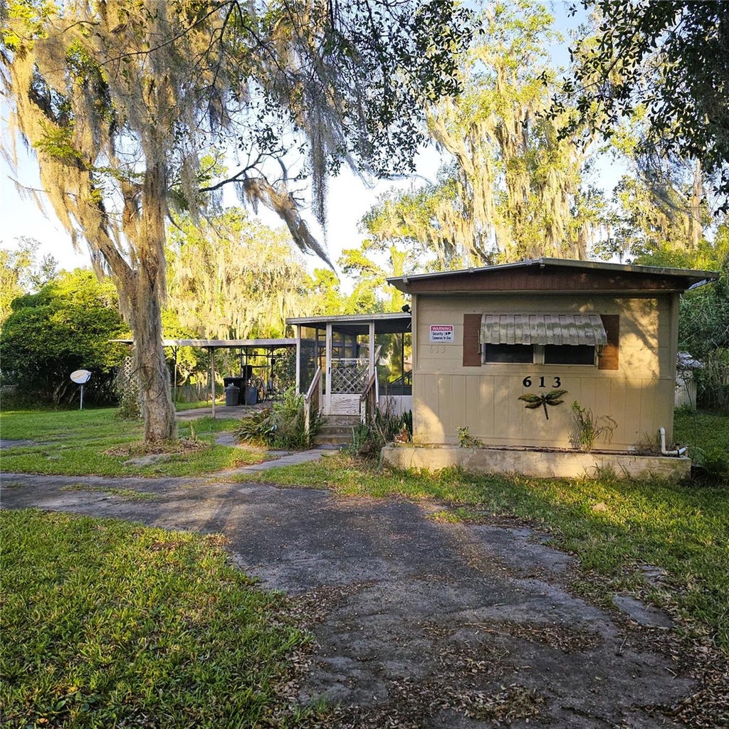 Photo of 613 Carpenter Road, Orlando, FL 32833 (MLS # O6452120)
