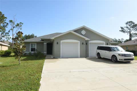 Photo of 77 Sea Trail, Palm Coast, FL 32164 (MLS # FC319545)