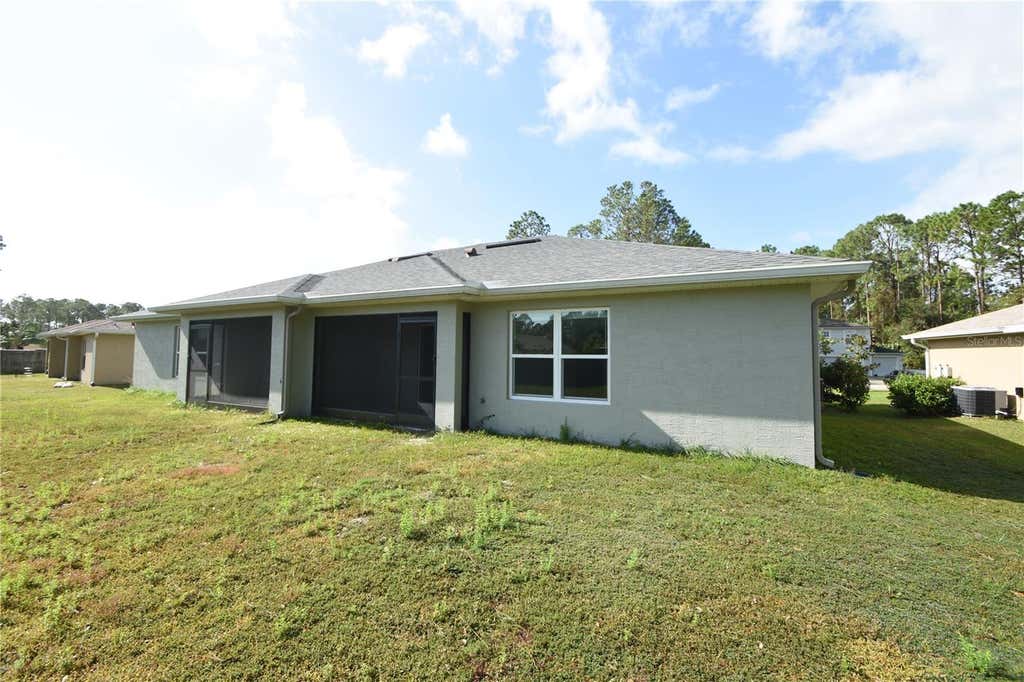 Photo of 77 Sea Trail, Palm Coast, FL 32164 (MLS # FC319545)