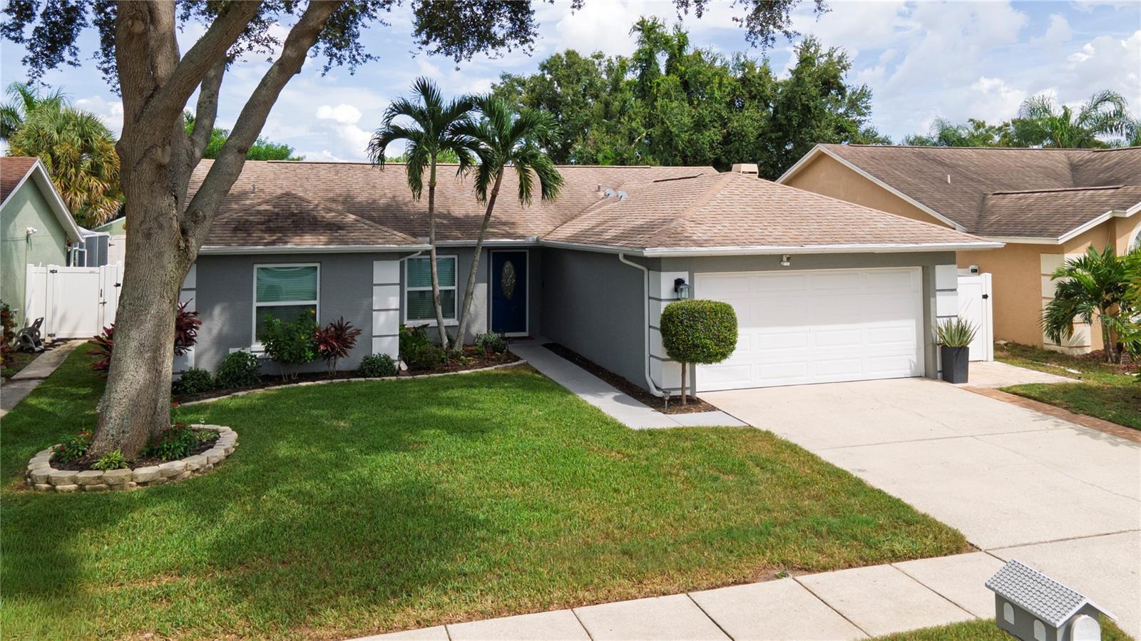On a scale of 10, this is an 11!! Impeccable turn key pool home. Back yard oasis with shimmering pool awaits! Pool was refinished with Pebble Tech in 2025. No maintenance artificial turf in the back yard, pool features wonderful custom bar area perfect for entertaining! Current owner has expanded the patio area and installed beautiful Travertine tile throughout the pool and patio area. The interior boasts a super light, bright and open floor plan! Gorgeous LVP flooring throughout. Kitchen features new LG black stainless steel appliances, center isle, Cambria Quartz countertops and wonderful custom cabinets. The large, open living area is perfect for entertaining or just a peaceful night relaxing at home, complete with a smokeless gas fireplace insert. Large dining room, flows with the kitchen and living room. And just off the entry there is a great space for an office or children's play area! All new windows and and 2 sets of sliding doors in the last several years. The indoor and outdoor renovations leave nothing to be desired, truly the perfect move in ready home! Location is superb with quick access to Indian Rocks Beach, Clearwater Beach, Downtown Dunedin, Bellaire with close access to all the Bay bridges, Tampa and St Pete. World Class Beaches, fine dining and shopping are all at your fingertips, what could be better!