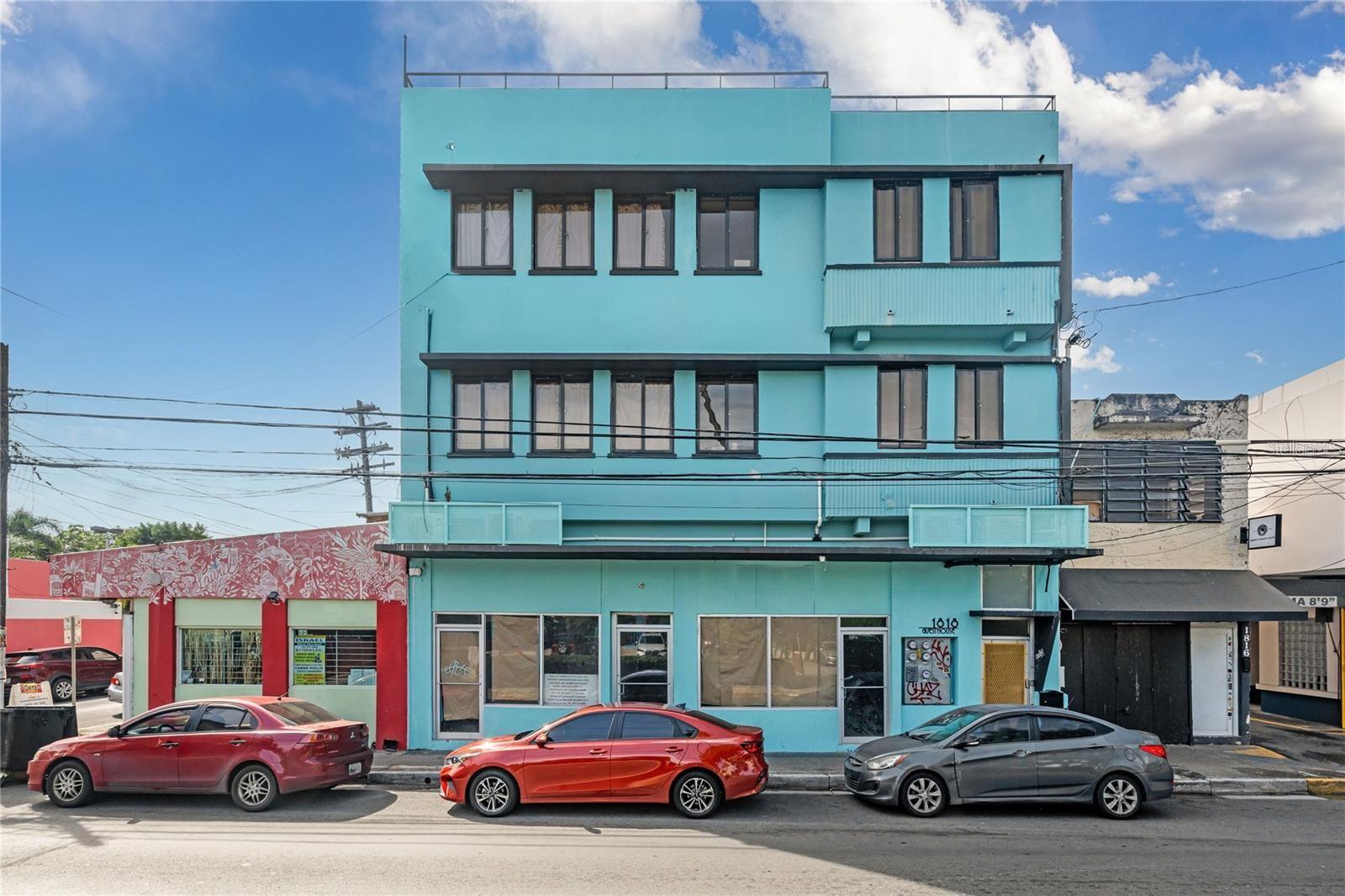 MULTIFUNCTIONAL COMMERCIAL & RESIDENTIAL BUILDING IN CALLE LOIZA
Mixed use building with 10-Units featuring spacious studios, one-bedroom, and two-bedroom —perfect for short-term visitors, long-term stays or boutique hotel with 2,500 of commercial space under construction, designed specifically for tax tourism incentives. Additional rooftop potential for expansion.
Diverse Accommodations: Featuring spacious studios, one-bedroom, and two-bedroom units—perfect for short-term visitors, a boutique hotel or long-term stays.
Commercial Versatility: The ground floor includes flexible and multiple commercial spaces for rental income or business use.
Amenities and Expansion Potential: A large open-air rear patio, already plumbed, provides an ideal setting for events or a potential restaurant. Additionally, the rooftop boasts stunning views of LoÃza, the ocean, and the mountains, with structural capacity for a buildout. Imagine creating a rooftop pool, restaurant, or bar to elevate the property’s appeal.
Tourism Investment Incentives: Property has conceptual endorsement and is eligible for a tax credits, and more.
Prime Location: Nestled in the heart of Calle LoÃza, known for its lively atmosphere, trendy eateries, cultural hotspots, and two blocks from the beach.