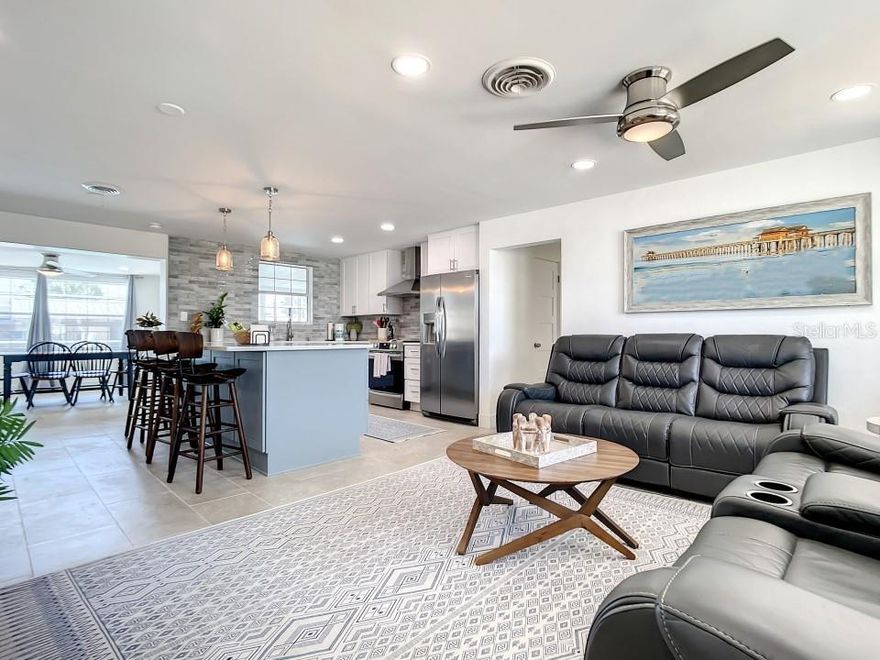 LOCATION LOCATION LOCATION!! This house has it all. If you want to live a life of paradise then look no further. Beachside home on 100-foot canal that leads straight out to the inter-coastal, BRAND NEW boat dock, NEW landscaping, privacy fence, fish cleaning station, Grill area, screened pool with BRAND NEW Solar heating and BRAND NEW POOL PUMP. Entertain in style with this completely remodeled 3 bedrooms/2 bath home. Gorgeous high-end solid surface countertops with all new SS appliances. Brand new tile throughout the entire house. Two driveways in front to fit multiple cars, boats, and RV. Includes direct RV hookup electric. House comes fully furnished and is move-in ready. Bring your clothes and toothbrush and begin living life by the beach as you always wanted.