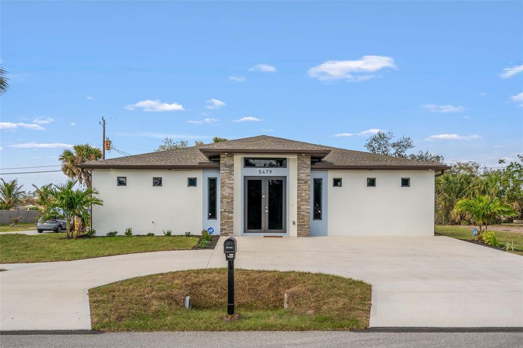 Photo of 5479 S Biscayne Drive, North Port, FL 34287 (MLS # C7519939)
