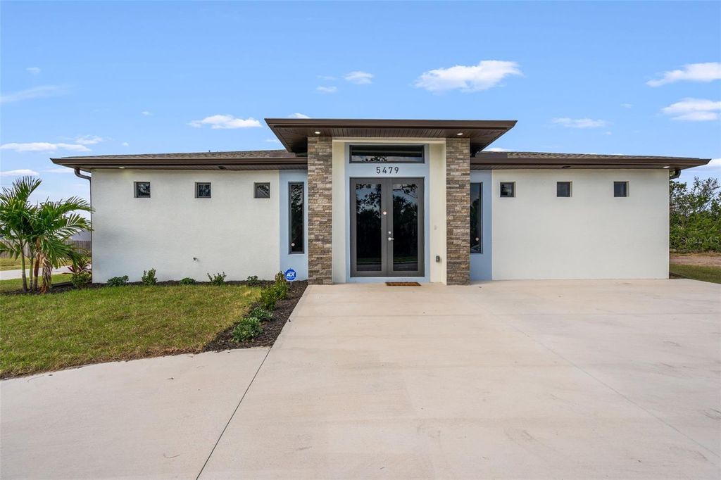 Photo of 5479 S Biscayne Drive, North Port, FL 34287 (MLS # C7519939)