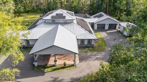 Photo of 28042 Lindenhurst Drive, Wesley Chapel, FL 33544 (MLS # TB8457588)