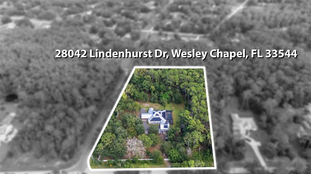 Photo of 28042 Lindenhurst Drive, Wesley Chapel, FL 33544 (MLS # TB8457588)