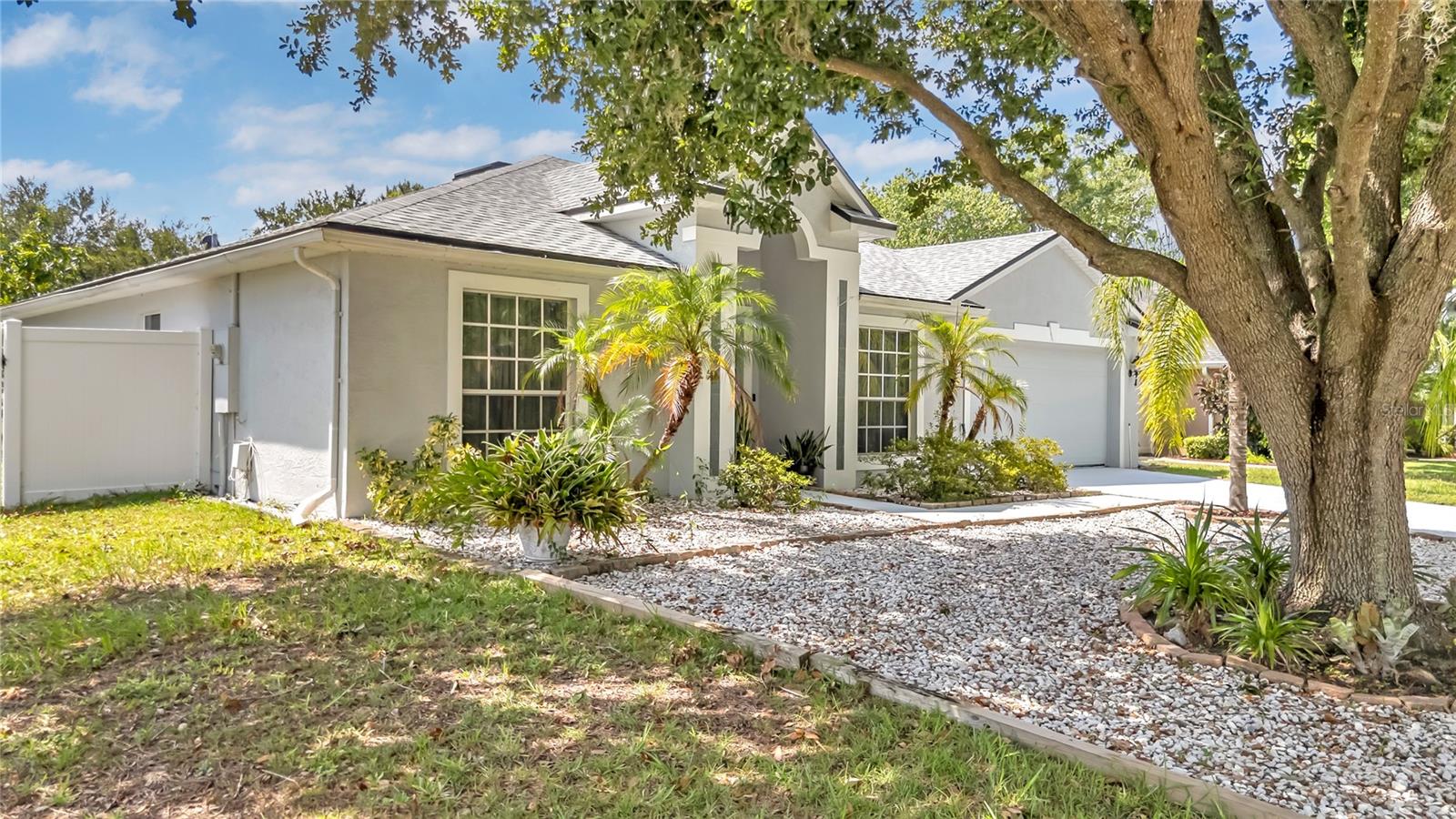 Welcome to your future home! This beautifully maintained property is a true gem in the heart of Deltona, offering the perfect blend of comfort, space, and convenience. From the moment you walk in, you’ll notice the pride of ownership; No carpet anywhere, just clean, easy-to-maintain flooring throughout. The spacious master suite is your private retreat, featuring a generous walk-in closet, a relaxing soaking tub, and a separate shower. Ideal for winding down after a long day. The open layout flows seamlessly into a covered lanai, perfect for enjoying Florida evenings with family and friends, rain or shine. It’s a cozy, inviting space that extends your living area outdoors.
Step outside to a fenced backyard that’s not only expansive but also filled with fruit trees, offering shade, beauty, and even a little something to harvest. With a brand-new roof from 2024, an unbeatable location, and easy access to major roads, this home is move-in ready and waiting to welcome you. Whether you’re a first-time buyer, growing family, or savvy investor, this property checks all the boxes.
Come see it for yourself and fall in love with the lifestyle it offers.