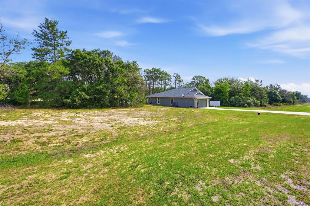 Photo of 141 Fisher Way, Ocklawaha, FL 32179 (MLS # G5112266)