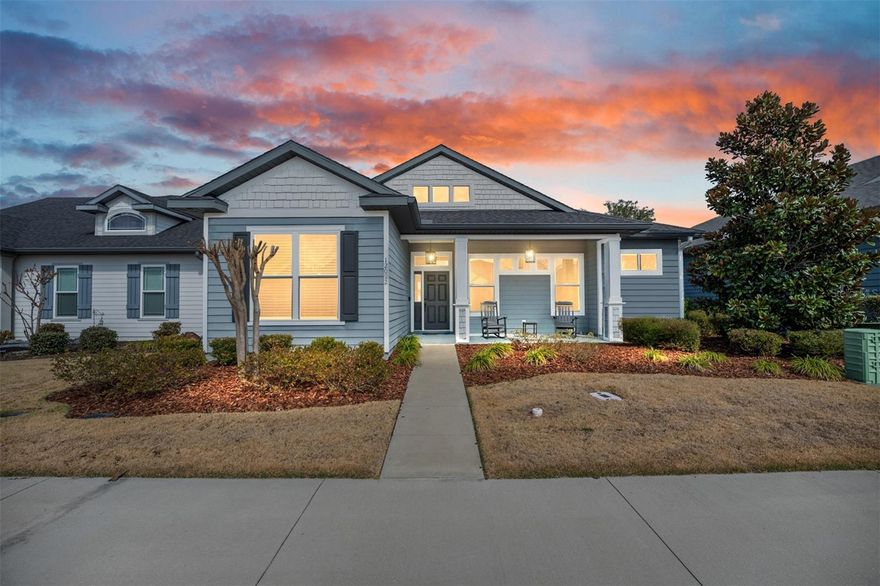 Timeless design meets modern efficiency in this light-filled 4BR/3BA Tommy Williams built “Soho II,” thoughtfully crafted for both elegance and everyday living. Designed to capture abundant natural light, the expansive open layout features soaring 10-foot ceilings, a tray ceiling in the Great Room, and 12-foot pocketing sliding glass doors that create seamless indoor-outdoor flow. The highly desirable floor plan offers exceptional privacy and flexibility, with two front bedrooms and full bath, a luxurious primary suite featuring a spa-inspired shower with dual showerheads and glass enclosure, and a separate rear wing with its own bedroom and full bath—ideal for guests, multigenerational living, or a private office retreat. Wood plank tile flooring extends throughout the main living areas, including the great room, kitchen, dining, hallways, and laundry room. The kitchen blends style and function with granite countertops, 42-inch maple cabinetry with soft-close drawers and doors, stainless appliances, a brand-new induction oven, upgraded wood pantry shelving, and a spacious island with added storage and built-in power. Outdoor living is equally inviting with a covered lanai and an extended paver patio complete with a wood-burning fire pit—perfect for year-round entertaining. Additional upgrades include epoxy garage flooring, mudroom, remote roller shade for the pocketed door, tankless water heater, full gutter system on both the home and garage, Tesla solar panels (approx. 2,000 watts), Ring alarm system, Sentricon termite protection, and an advanced indoor air quality system designed to promote healthier living. Located in the resort-style community of Oakmont, residents enjoy access to a clubhouse, pool with amphitheater, fitness center, tennis courts, soccer fields, and more. Offering upgraded finishes, energy efficiency, established value and move-in readiness, this home presents an exceptional opportunity in one of the area’s most sought-after neighborhoods.