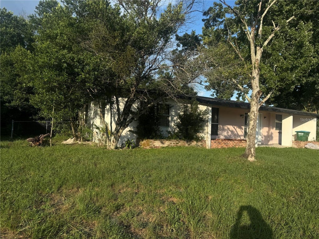 Photo of 589 E Normandy Boulevard, Deltona, FL 32725 (MLS # O6453464)