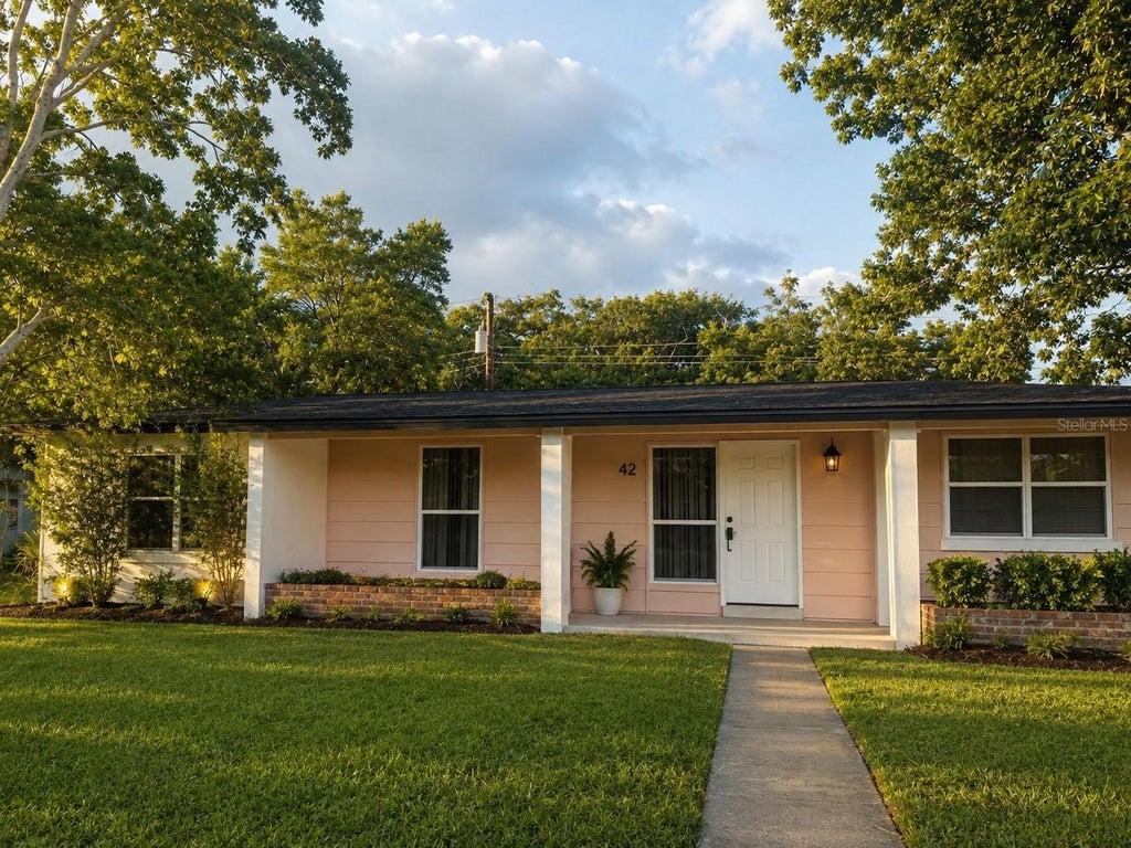 Photo of 589 E Normandy Boulevard, Deltona, FL 32725 (MLS # O6453464)