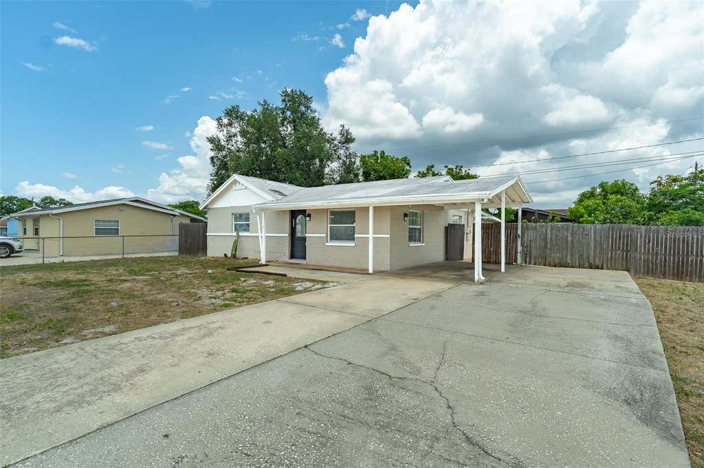 Photo of 6001 Crestridge Road, Tampa, FL 33634 (MLS # TB8518161)
