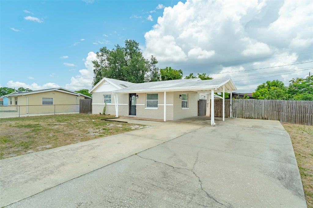 Photo of 6001 Crestridge Road, Tampa, FL 33634 (MLS # TB8518161)