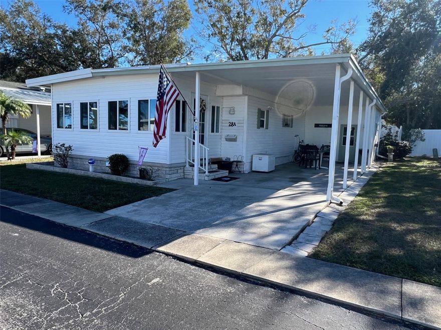 Wake up every day feeling like you’re on vacation at Pointe West Mobile Home Park, a well-known 55+ community situated on beautiful Lake Seminole. Presenting a new listing of a 2-bedroom 1.5-bathroom home with no rear neighbors, allowing for privacy. This inviting neighborhood places you just a few miles from stunning beaches and within close proximity to shopping, restaurants, and entertainment, while offering a quick jaunt to the airport—perfect for residents who enjoy seasonal living at the park. Within the community, amenities are designed to keep you active and foster camaraderie among neighbors, whether you’re taking a refreshing swim in the pool, enjoying shuffleboard or billiards, casting a line with easy access to fishing on Lake Seminole via the boat ramp, or relaxing during a peaceful picnic. Best of all, a single monthly maintenance fee of $300.00 covers water, sewer, garbage, and lawn care, so there are truly no worries—just time to enjoy the idyllic lifestyle!
INTERIOR:
Take in the details of this home, remodeled in 2021, offered fully furnished and featuring central heat and air (2021), some paneling, but mostly drywall, laminate flooring, and ceiling fans for year-round comfort. A raised front Florida room welcomes you with new flooring, new windows, and finished drywall, providing a versatile space large enough for entertaining, a home office, crafts, or an exercise room. Entering through the sliding glass door, the living room invites you in with ample room to relax and gather. The flow continues into the recently modernized, huge eat-in kitchen, highlighted by a tile backsplash, granite countertops, a full stainless steel appliance package, and extensive cupboard space for storage. The renovated (2021) guest bathroom is easily accessible for everyday use while being ideal for overnight visitors, featuring a walk-in shower and storage neatly tucked beneath the vanity. The pleasant guest bedroom offers generous dimensions, allowing room for a larger bed or the flexibility to be reimagined as a home office. Conveniently located just off the guest bedroom is a door leading to a shed, which houses the washer and dryer, eliminating the need to go off-site on laundry day! Completing the home's layout, the primary bedroom provides ample space and is complemented by a mirrored closet and an updated en suite, half bath with a toilet and sink, creating a well-appointed owner’s sanctuary.
EXTERIOR:
A well-kept exterior immediately catches your eye with its attractive vinyl siding, complemented by a two-car carport and a roof-over (2016) providing added protection. A handy workshop located in the rear of the home permits the perfect space for DIY projects, hobbies, or extra storage of yard tools. Priced at $154,500 and including a share, this home truly checks all the boxes!