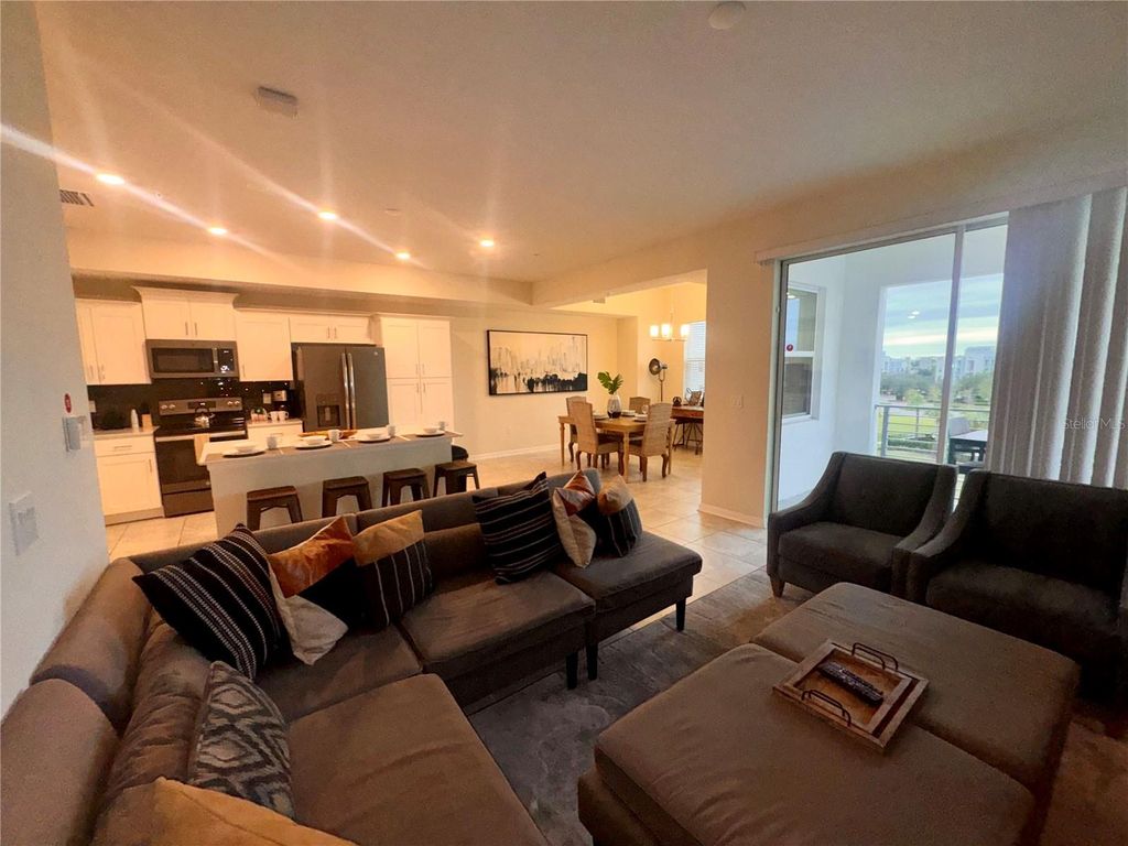 Photo of 3150 Paradox Circle #406, Kissimmee, FL 34746 (MLS # O6371172)