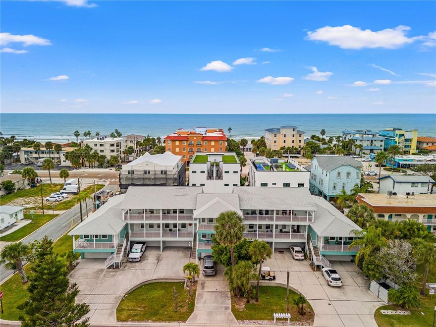 Welcome to coastal living at its finest — a rare opportunity to own a three-story beach-side residence that blends the feel of a private townhome with the convenience and low-maintenance lifestyle of condo living. Just a short walk to the sand, surf, and vibrant beachfront dining, this home delivers the best of Florida living. Step inside and you’ll immediately notice the thoughtful layout. The main living level offers an open-concept floor plan perfect for entertaining, with abundant natural light and coastal breezes. The top floor features spacious bedrooms designed for privacy and relaxation, including a generous primary suite. What truly sets this home apart is the enclosed ground-level garage and bonus flex-space — an incredibly valuable feature in this area. Whether you're envisioning a home gym, workshop, art studio, game room, or private retreat for guests, this versatile space is ready to fit your lifestyle. This lower-level flex space previously experienced flood damage, like many homes in the surrounding beach community. The owner proactively and professionally restored it, ensuring it has been thoughtfully put back together for peace of mind and full functionality. Buyers benefit from transparent history and a space that has already been handled and improved. Outdoor living is easy here — enjoy morning coffee on your balcony, take a short stroll to the Gulf to unwind at sunset, or bike to nearby restaurants, parks, and shops. This is where coastal convenience meets flexible living. If you’ve been looking for a beach-area property that offers privacy, storage, lifestyle flexibility, and walkability — this is the one that checks every box.