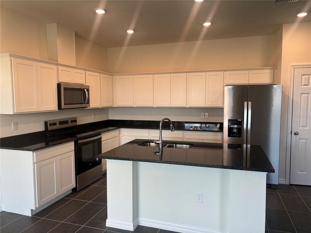 Photo of 2347 Selenia Street, Lake Alfred, FL 33850 (MLS # C7517040)