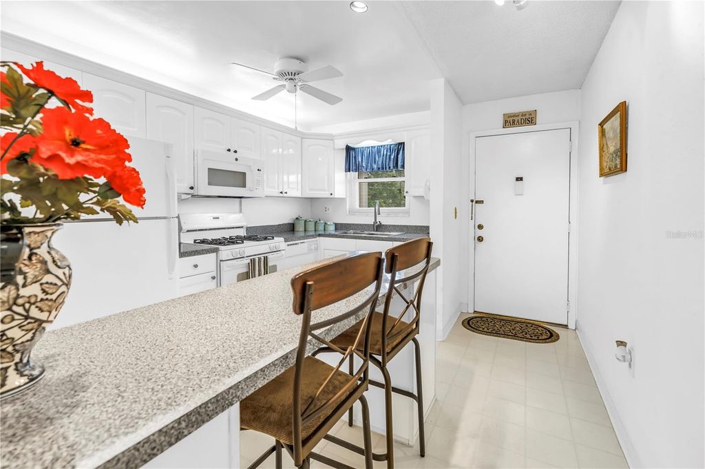 Photo of 9950 62nd Terrace N #209, St Petersburg, FL 33708 (MLS # TB8436164)