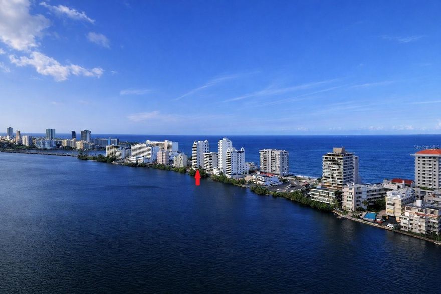 FULL-FLOOR PENTHOUSE · ASHFORD LAGOON PLAZA · CONDADO

A truly rare offering in the heart of Condado. This extraordinary penthouse occupies the entire 17th floor (PH-17) of Ashford Lagoon Plaza, delivering an unmatched combination of scale, privacy, and panoramic coastal views rarely found in Puerto Rico’s luxury market.

Spanning approximately 6,600 square feet across two levels plus a mezzanine (5,729 sq ft GLA), the residence is designed to feel more like a private sky villa than a traditional condominium. The layout includes 6 bedrooms, 4 full bathrooms, and 2 half bathrooms, offering exceptional flexibility for both family living and entertaining.

Three expansive terraces provide spectacular views in every direction. To the north, enjoy permanently unobstructed vistas of the Atlantic Ocean. To the south, sweeping views stretch across Condado Lagoon and the vibrant city skyline, creating a stunning contrast between ocean and lagoon.

Privacy begins the moment you arrive. Two private key-access elevators open directly into the residence through an exclusive foyer, ensuring complete discretion and a true full-floor living experience.

Inside, the penthouse offers generous spaces ideal for luxury living, including areas that can accommodate a private gym, a spacious family lounge overlooking the lagoon and city, and a dedicated wine cellar.

Ashford Lagoon Plaza offers residents direct lagoon access via a private wooden dock, as well as a lobby, gym, service areas, and a full-capacity backup generator for the entire building, an increasingly valuable feature in Condado.

One of the most remarkable advantages of this residence is the inclusion of 8 covered parking spaces, configured as four back-to-back pairs. In a market where most luxury penthouses offer 4 to 5 spaces, this level of parking capacity is exceptionally rare and highly valuable.

Compared with other Condado penthouses typically ranging between 2,800 and 4,000 square feet, this residence offers significantly larger living space and double the parking capacity, making it a truly unique opportunity in one of Puerto Rico’s most desirable coastal neighborhoods.

This is more than a penthouse it is a full-floor private residence above the Condado skyline, combining space, views, and exclusivity in a way that is increasingly impossible to replicate.