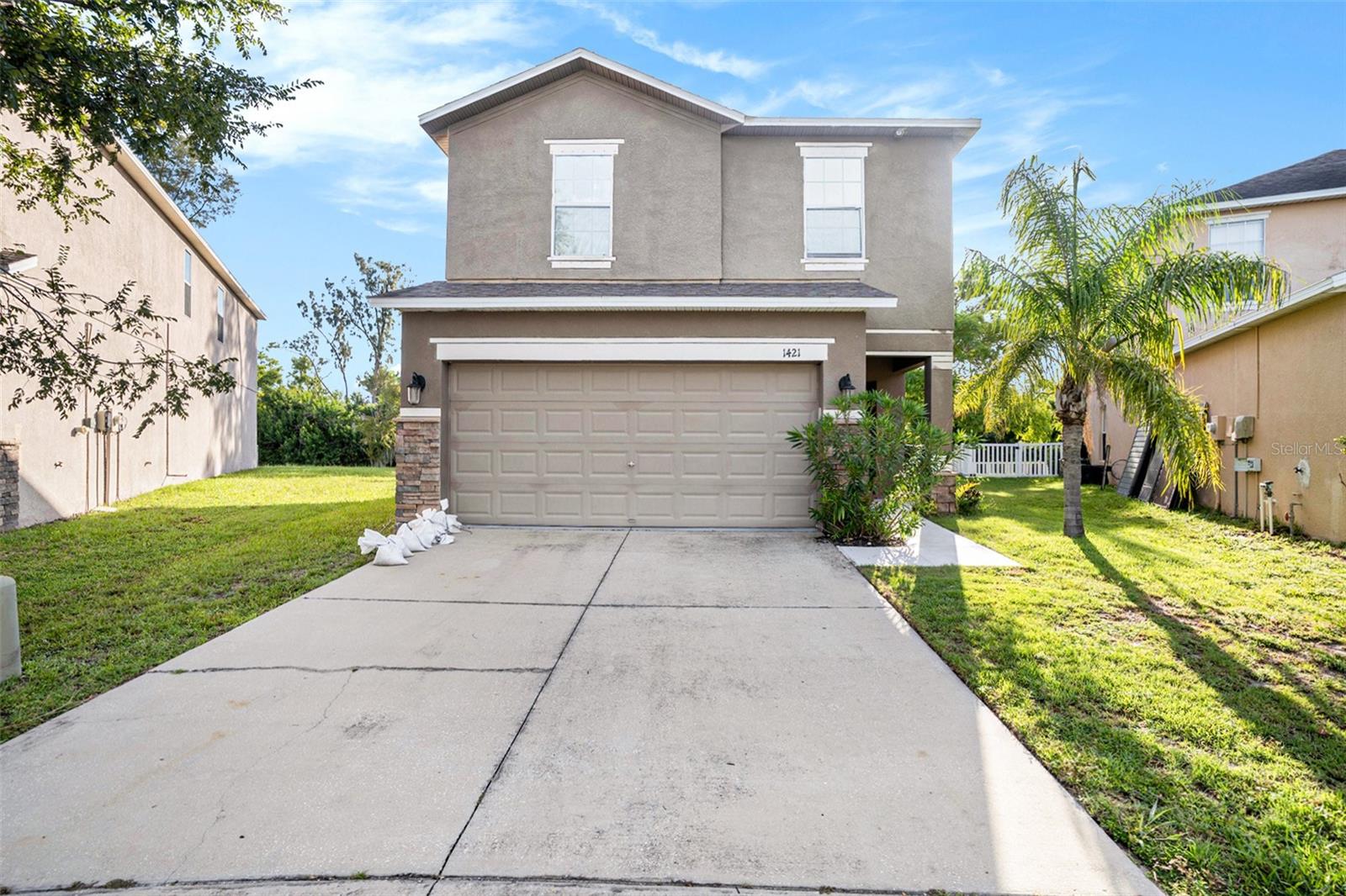Welcome to this spacious 4-bedroom, 2.5-bathroom home in the Bahia Lakes community of Ruskin. Perfectly positioned on a quiet cul-de-sac and backing to a serene preserve, this two-story home offers privacy, space, and great potential with some updates, including a new roof and some drywall repairs. Inside, the main level features a living room/dining room combo with wood-look vinyl flooring and a convenient under-stairs closet. The kitchen/family room combo is ideal for gatherings, offering stainless steel appliances, granite countertops, a center island, separate pantry, breakfast nook, and ceiling fans for comfort. The spacious family room flows effortlessly to the screened-in lanai through sliding glass doors, perfect for enjoying the Florida lifestyle year-round and view of the preserve. A half bath completes the downstairs layout. Upstairs, you’ll find all four bedrooms, including the generous primary suite with a walk-in closet and an attached bath featuring a double sink vanity, a soaking tub, glass-enclosed shower, and private water closet. Additional bedrooms are well-sized and share a full bathroom. The large backyard offers plenty of space for outdoor activities, all with the peaceful backdrop of the preserve. The Bahia Lakes HOA provides access to a community pool and playground, and the location is close to local dining options, shopping, and more. With its excellent location, roomy layout, and community amenities, this home is a fantastic opportunity for buyers ready to add their own touches. Schedule your private showing today!
