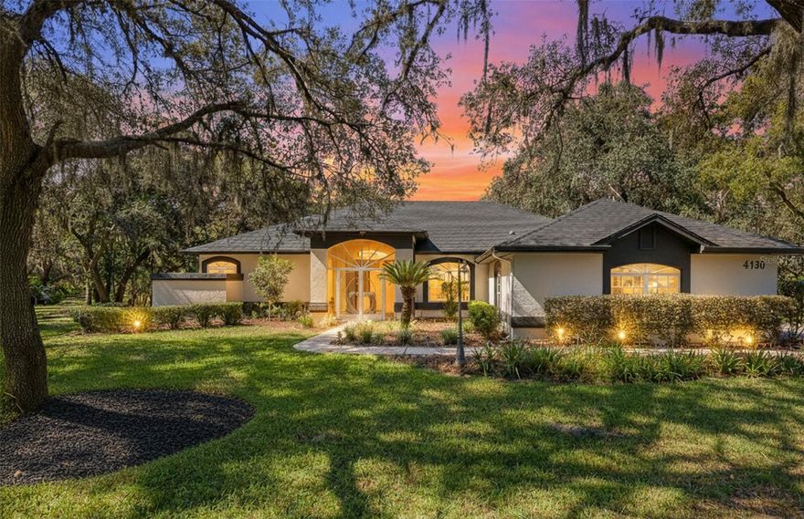 One or more photo(s) has been virtually staged. Welcome to 4130 N Indianhead Rd, located on 1-acre homesite in Hernando, FL. This updated residence has a functional layout designed for comfort, storage, privacy, and everyday living. The home features solid oak cabinetry, custom vanities with vessel sinks, travertine flooring, new luxury vinyl plank flooring, and new carpet. The kitchen includes Cattalatta quartz countertops and coordinated finishes for a cohesive look. Multiple living areas provide flexibility for work, entertainment, or relaxation. Each bedroom offers private space with natural light and access to the home’s flowing layout. Outdoor Features The screened pool and spa area has been recently updated, including new resurfacing, new LED lighting, a new pool pump, upgraded valves, and new water features. A built-in outdoor kitchen provides a designated space for cooking and gathering. The property has an extended parking capacity with an oversized driveway accommodating multiple vehicles. The full perimeter fencing offers privacy and space for outdoor enjoyment. Notable Upgrades & Features fenced yard -1-acre homesite Screened pool & spa with recent resurfacing New pool equipment and LED lighting Outdoor kitchen area Oversized driveway (multi-vehicle capacity) Cattalatta quartz countertops brand new kitchen oak cabinetry Travertine flooring + new LVP and new carpet Custom vessel-sink bathroom vanities Community Membership This property includes an annual Terra Vista Skyview membership, providing access to community amenities (per membership terms), including: Fitness and wellness facilities Indoor and outdoor pools Tennis and pickleball courts Golf access (as applicable to membership tier) Dining, social, and club facilities Parks, areas, and maintained community grounds