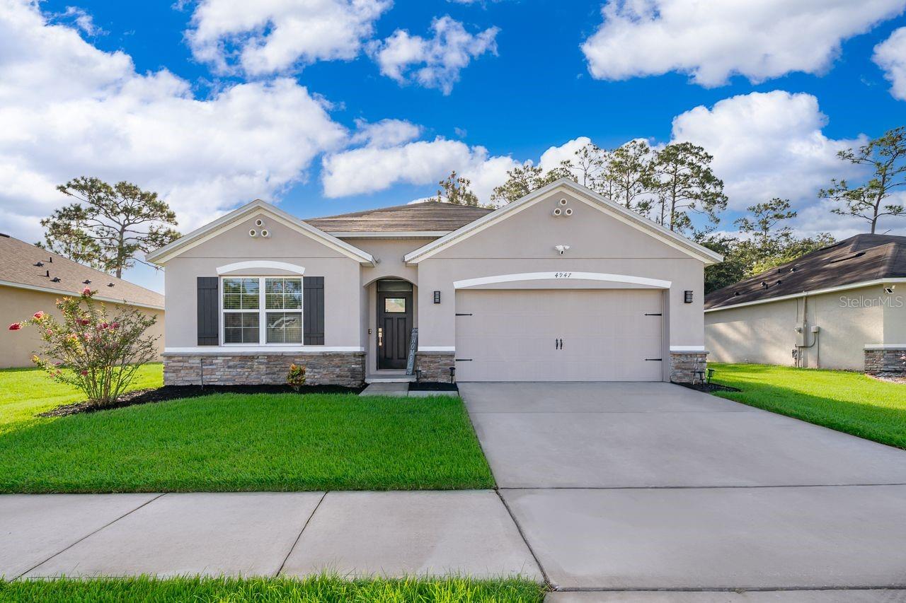 Welcome to Perfection, this home has been rebuilt from the inside out; absolutely EVERYTHING has been updated! Enter into Foyer onto
Porcelain tile in hallway, Kitchen & Baths. Cabinets have been custom gray washed, Quartz Countertops added, Tear Drop Lighting over an extensive breakfast bar, Stainless Steel Appliances and a Custom walk in Pantry. Kitchen flows into the Dining Room adorned with a lovely chandelier, chair rail and view of back yard. Custom window sills have been added to Living room as well as and 5 1/4" baseboard throughout home. Fresh paint on interior and exterior. Enjoy Bar-B-Ques on your Screened Lanai in the privacy of your fenced backyard Oasis, Brand New 6' PVC fencing on sides and 4' on rear. Moving onto the bedrooms, all include luxury vinyl and 3 have custom built in closets and ceiling fans. Master bathroom has his/her sinks, custom cabinetry and Quartz tops with crown molding added in water closet. Secondary bathroom with custom cabinetry, Quartz top, crown molding and barn door shower door. Garage has a sheened concrete floor, painted walls, plywood added for lots of attic storage and garage door opener. Trafalgar has a manned gate 24/7 attendant and this community comes with an array of amenities to include;Movie Theater, community pool, fitness center, recreation room with pool table and arcades, basketball and tennis courts, plus a lovely walk path with a bridge over water. HOA fee includes daily trash collection (except Sunday) and lawn care. Not a bad package deal for only $265. a month. Why not take a look inside, I guarantee you will be impressed! This home is move in ready, absolutely NO deferred maintenance here.