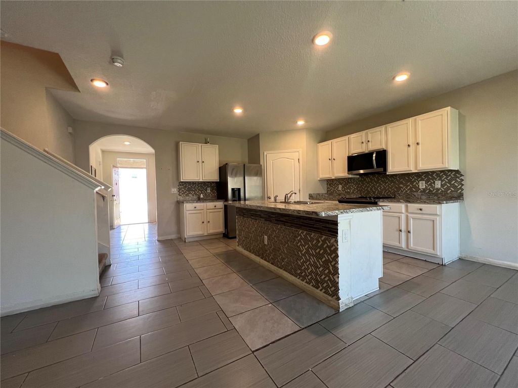 Photo of 1378 Fox Squirrel Drive, Davenport, FL 33897 (MLS # O6400257)