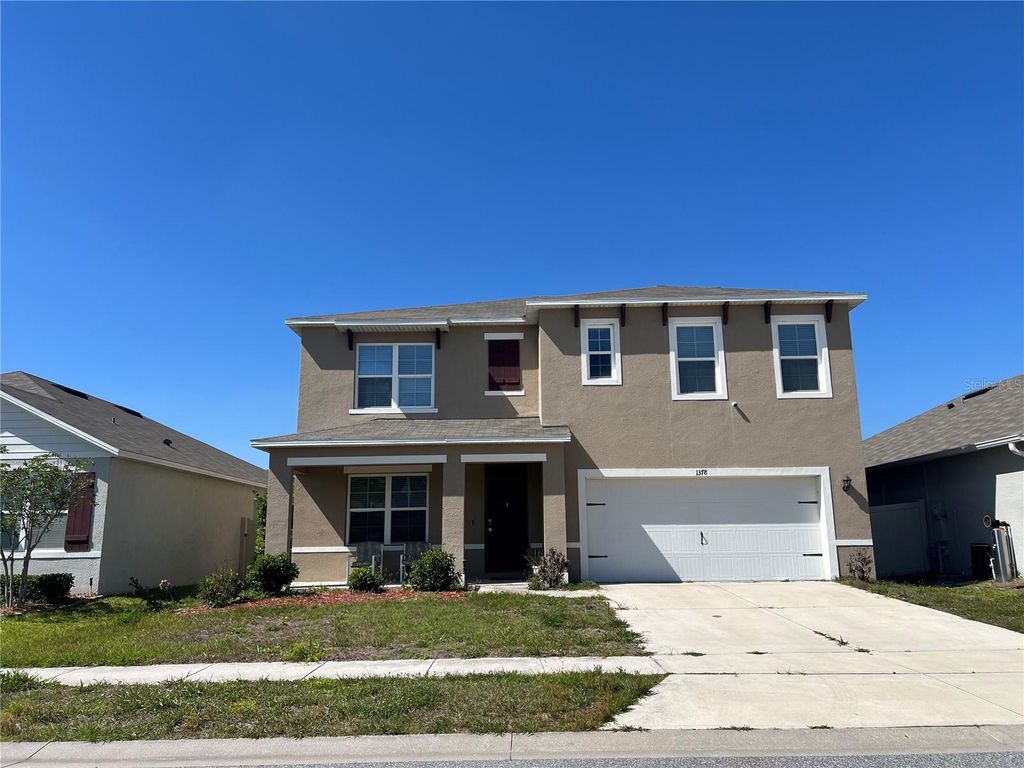 Photo of 1378 Fox Squirrel Drive, Davenport, FL 33897 (MLS # O6400257)