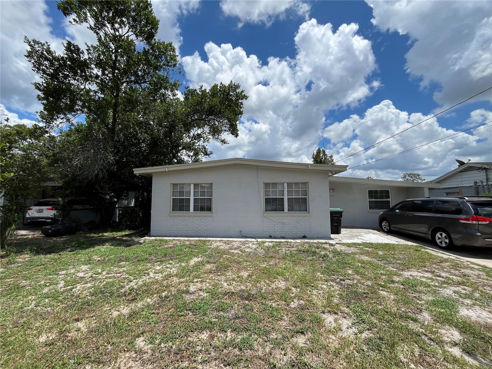 Discover this solid 3-bedroom, 2-bath single-family home in 32808 Orlando, built with durable block construction. Step inside from the welcoming foyer into an open living and family room combo, offering ample space for various décor styles. The centrally located kitchen provides generous cabinet and counter space along with a small work station, while the adjacent dining room is perfect for gatherings. The spacious master bedroom features large windows that fill the room with natural light and includes a built-in storage area with pull-out drawers. Two additional bedrooms share a full bath with a tub/shower combo. An inside utility with W/D hookup, a large screened porch, and a roomy fenced backyard complete this inviting property. Act now! This one won’t last long! All applicants are required to do a credit and background check. Renters insurance is required.
