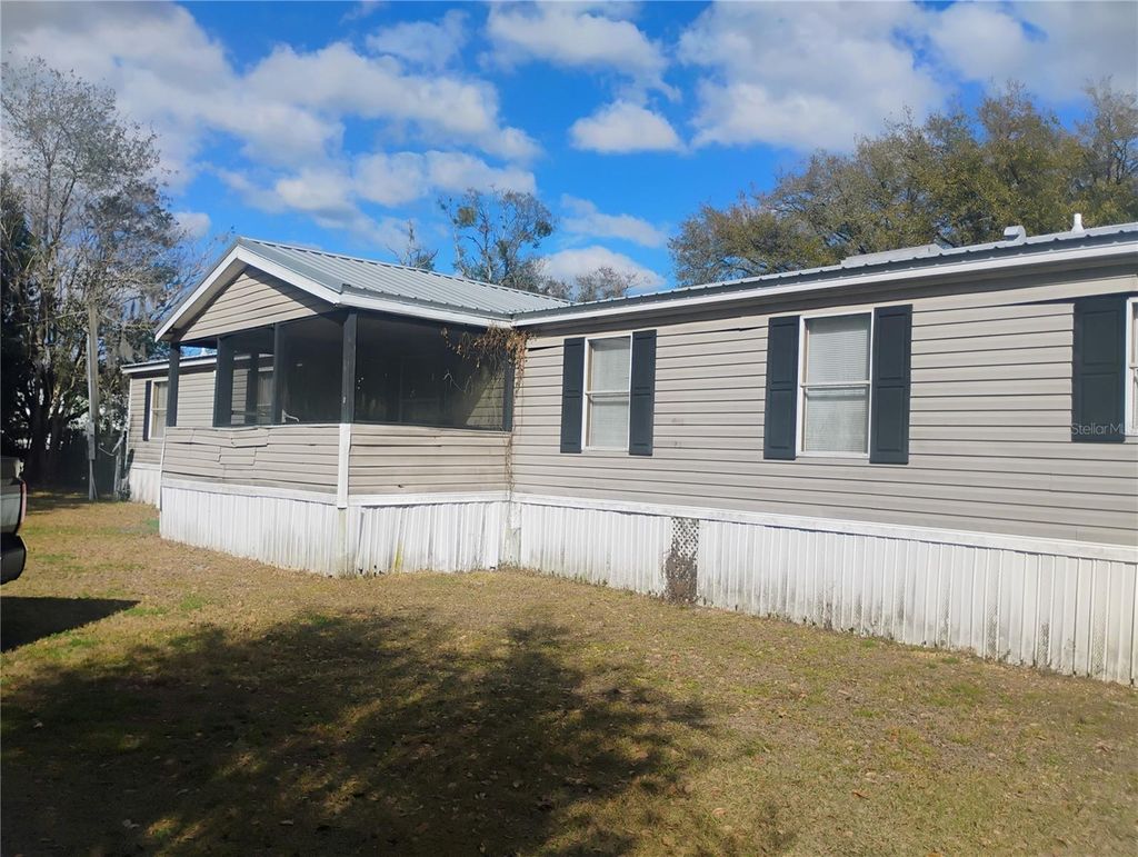 Photo of 701 Seminole Sand Road, Plant City, FL 33566 (MLS # L4959512)