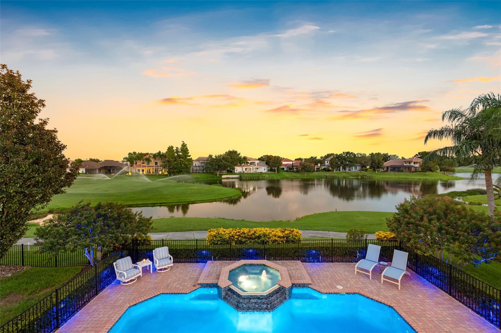 Grip it and rip it with this custom built pool home overlooking the 11th fairway of Fox Hollow Golf Club & gorgeous pond views. This executive worthy home is just shy of 5,000 SqFt heated and 6,200 SqFt under roof! So many impressive features to list such as a professional grade kitchen with high-end appliances, a jaw-dropping 22’ foyer with a 5’ crystal chandelier and a stunning spiral staircase, gorgeous heated resort style pool/spa, 12 ft high ceilings throughout, plantation shutters, dual garages with space for 4 full size vehicles and more! This home offers 5 bedrooms, 4 1/2 baths with the master bedroom and one guest room on the main floor and 3 bedrooms on the 2nd floor. All the rooms in this home are generously sized and have their own bathroom with the exception of 2 bedrooms which share a dual vanity upstairs. There is also a balcony on the second floor that overlooks the pool area with unobstructed water and golf course views. The head Chef in the family will surely appreciate the 22’ x 20’ kitchen which features granite, a Wolf gourmet programmable double oven, Wolf 6-burner gas range top with a 48” Monogram commercial range hood with utensil rack, removable grease trays and two infrared warming lights, Thermador 36” professional convection warming drawer, Subzero Pro 48 dual refrigerator and Subzero 86 bottle wine refrigerator with 2 drawer refrigeration. The kitchen is outfitted with professionally painted solid wood cabinets, a custom walk in pantry and large island with a sink. If you don’t know how to cook, this kitchen will certainly inspire you to learn ;-) You will enjoy countless hours on your huge 2,000 Sq Ft resort style lanai with a 33’L x 19’Wx 6’ D pool, jetted & heated spa, outdoor kitchen and a 20’ x 12’ automatic awning that extends shade during those hot summer months. Other recent updates include: interior and exterior painting, EV charger, tankless water heater, multi-color landscape lighting and pool equipment. Champions Club offers fantastic amenities included in your HOA fees such as a resort style pool/spa, fitness center, tennis, pickle ball, basketball, locker rooms and more! They also hold community events throughout the year. Love to golf? You are welcome to join the Fox Hollow Golf club for an additional fee and the on-site restaurant that is open to all. Conveniently located near A-rated schools, shopping, dining, hospitals and major highways! Virtually staging was used in the dining and breakfast areas.