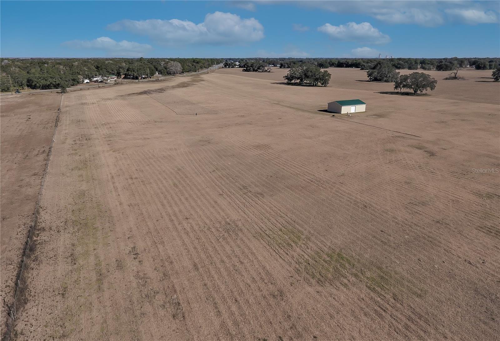 Capitalize on this prime location along Hwy 301 in Sumterville. This 22.16 Acres is zoned C-2 Commercial, ideal for Retail Sales and Services/Outdoor Display, Restaurants, Convenience Stores with or without Fuel Service, Health/Exercise Clubs, Rental Storage Facilities, Banks, Car Wash and the list goes on. It is located in Sumter County within the City of Bushnell limits. The road frontage is 1084 feet with public sewer and water running along the main highway. The parcels of land surrounding the property to the right and back are properties being developed by Sumter Villas LLC who purchased an additional 70 acres. The properties to the left and around the back totaling 345 acres were recently purchased by Southern Oaks Crossings LLC. The ever-expanding Villages is close by and the newly built state of the art Villages Charter School is only 5.6 miles from this property. Don’t miss the opportunity to own this Prime Commercial Location.