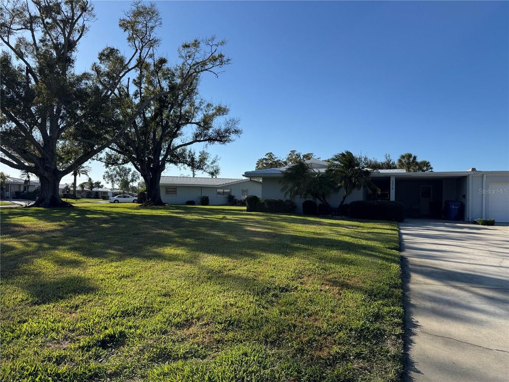 Photo of 3318 Village Green Drive #823, Sarasota, FL 34239 (MLS # N6142788)