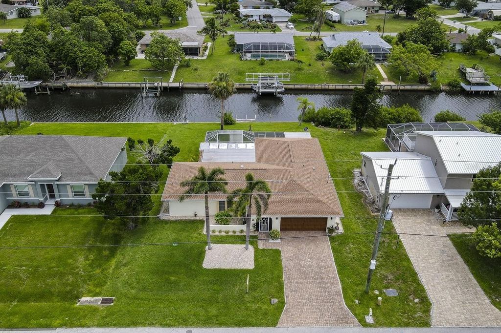 Photo of 2220 Broad Ranch Dr, Port Charlotte, FL 33948 (MLS # C7511783)