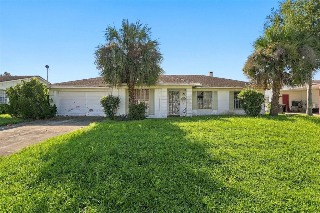 Photo of 1147 Coretta Way, Orlando, FL 32805 (MLS # O6443708)